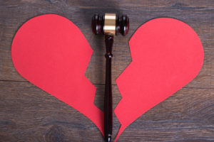 Gavel and broken heart shape in divorce concept